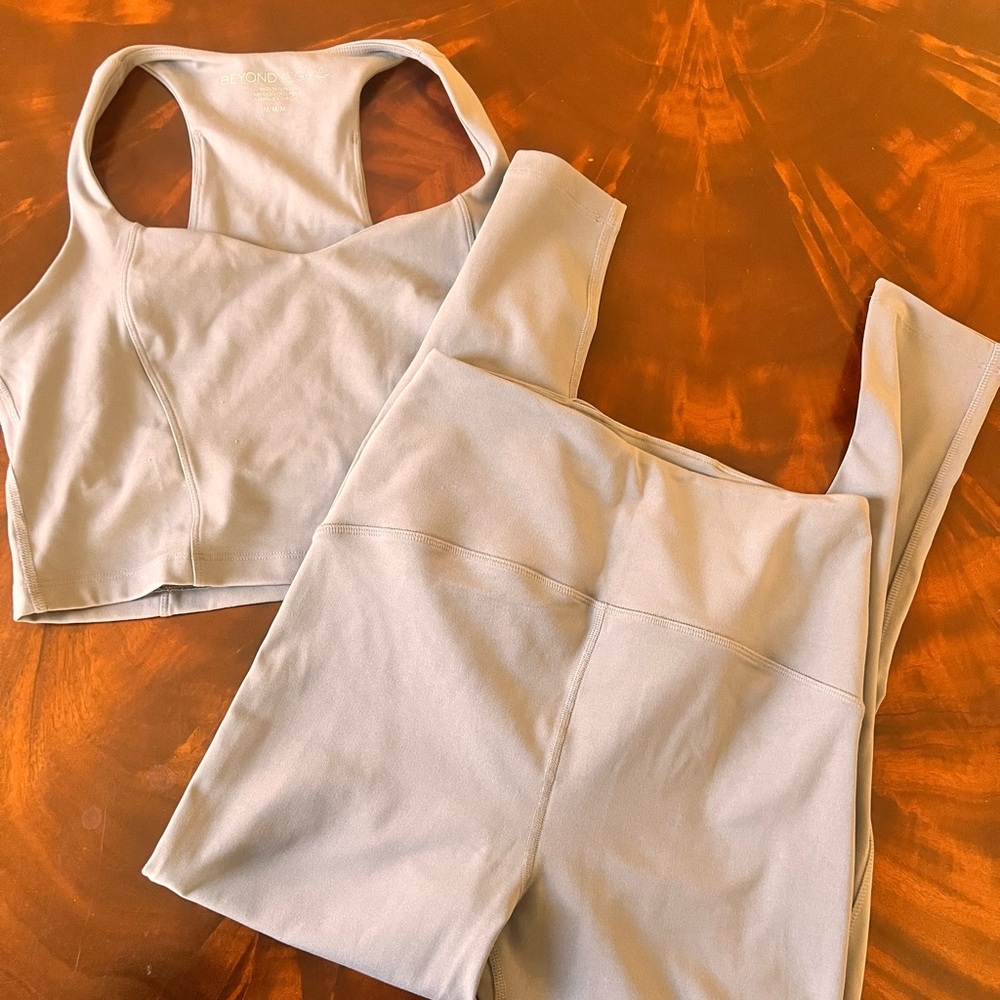 Beyond Yoga Set: Powerbeyond Midi Legging Cropped Tank Top.